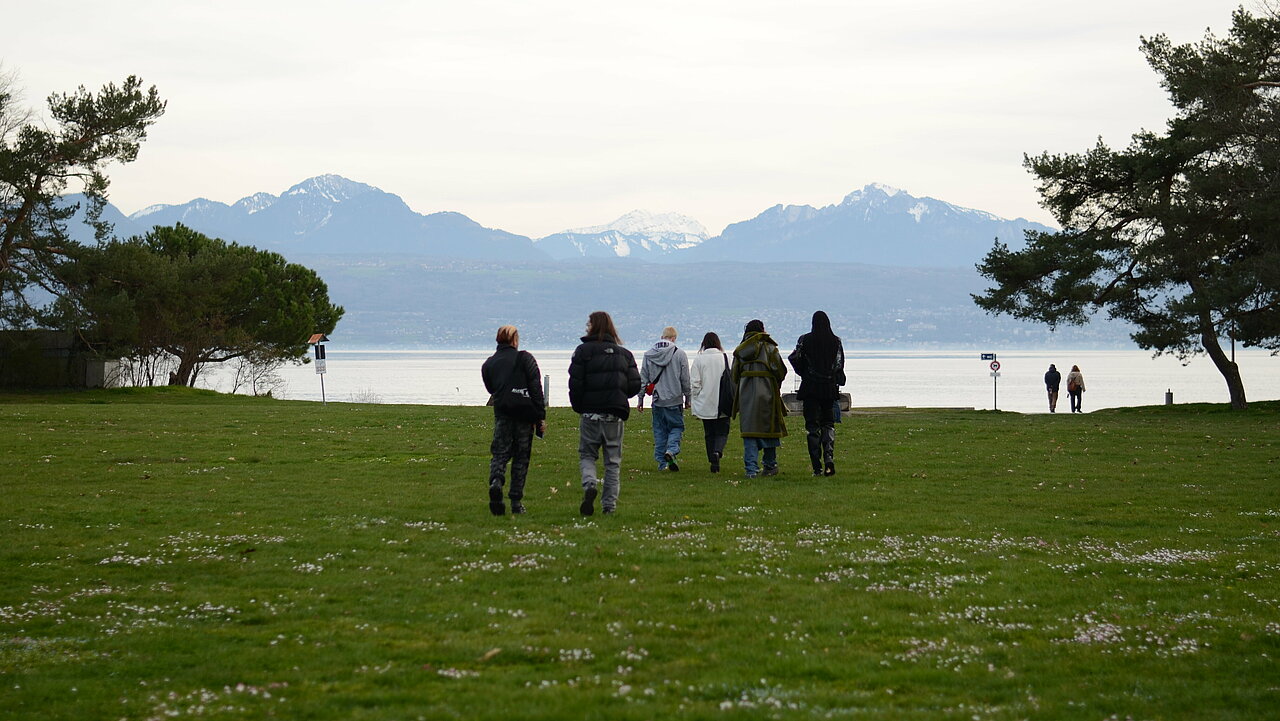 Creative Crossroad artists walking towards the lake.