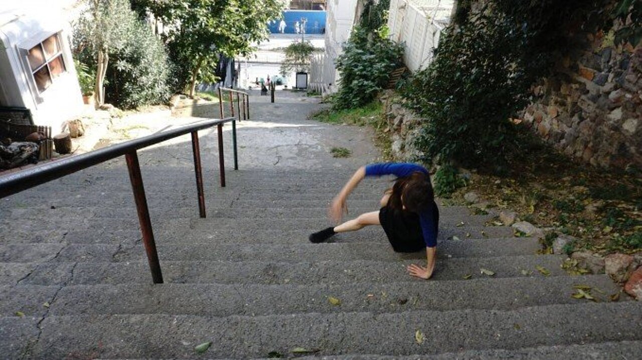 Dancer moving on stairs.