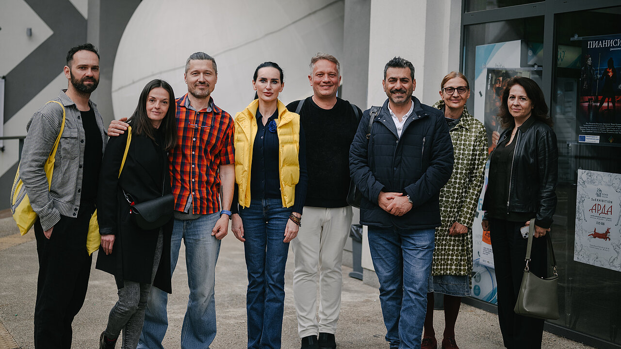 Antistatic team and artists in front of Toplocentrala.