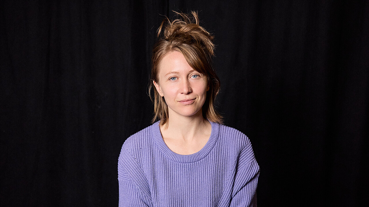 Portrait of Nathalie Campbell, black background