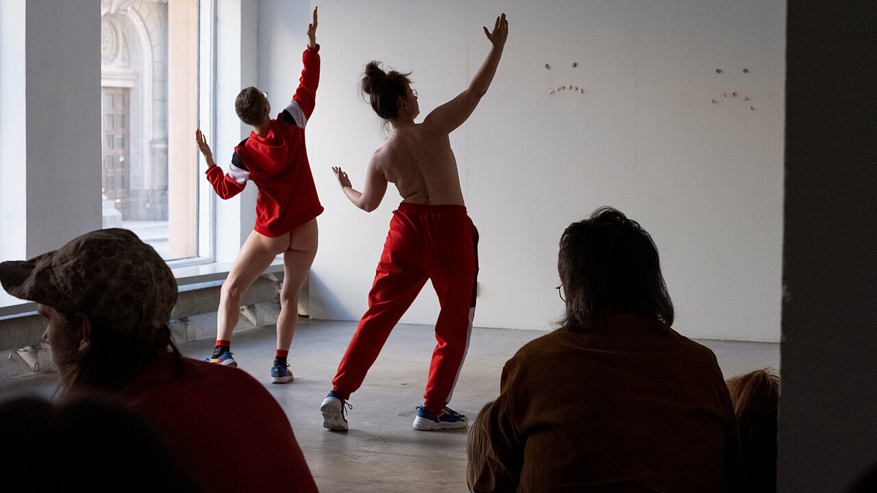 Two performers, dancing
